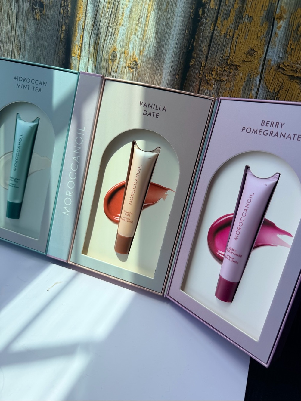 Moroccanoil Tinted Lip Trio - Mint Green, Peach, Lavender Pink